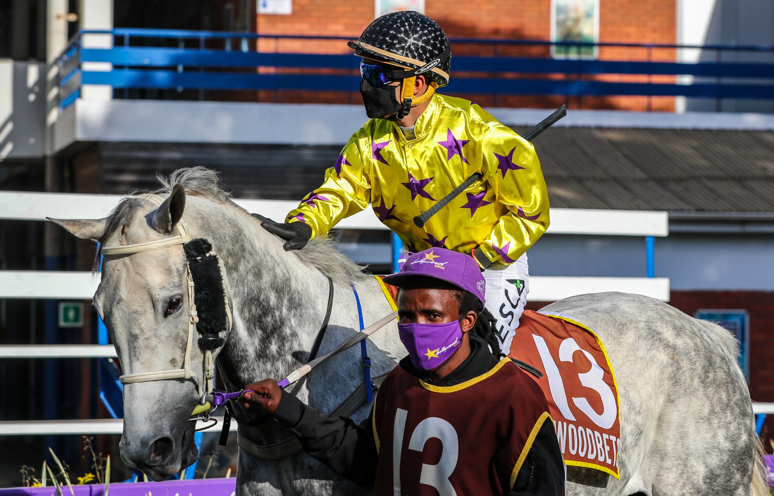 Jockey on grey horse